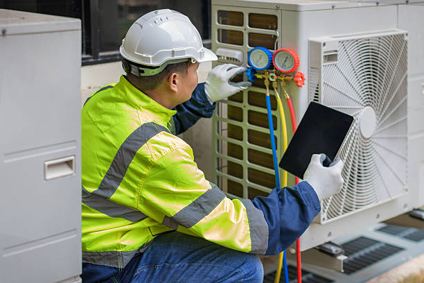 Professional Hvac technician working in DeWitt, MI